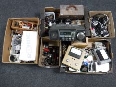 Five boxes containing assorted transistor and valve radio parts, bulbs, battery units,