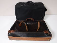 A Trussardi vintage leather case with a luggage case