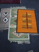 Three fringed Eastern rugs