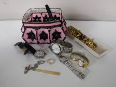 A box containing a 9ct gold wedding band,