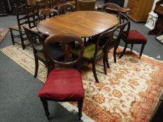 A Victorian mahogany wind out dining table on claw and ball feet,