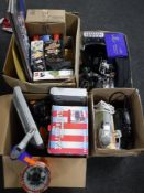 Four boxes containing kitchen electricals, assorted toys, Lego, cameras with lenses ,