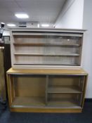 A mid twentieth century sliding glass door bookcase,