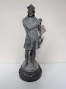A spelter figure on wooden base - King Arthur,