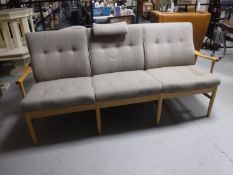 A late twentieth century a Danish Farstrup beech framed three seater settee