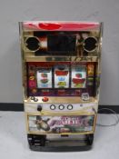 A Lara Croft Tomb Raider Japanese fruit machine with key