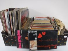 A boxed containing a large quantity of LP's and 45 singles, 70's,