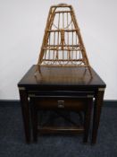 A nest of two contemporary tables with metal mounts,