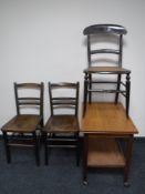 A teak two tier turnover top trolley,