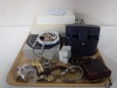 A tray containing a sterling silver necklace, together with a large quantity of watches,