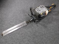 A Titan TTL531HDC petrol hedge trimmer