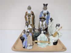 A tray containing ten Japanese pottery figures