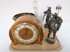 A tray of walnut mantel clock, wooden comport, glass decanter,