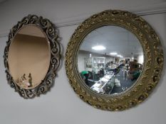 A circular gilt framed convex,