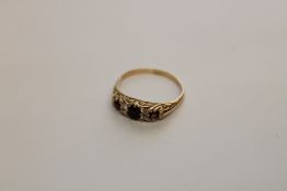 An antique ruby and diamond ring, size M, 2g.