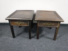 A pair of Moroccan style side tables