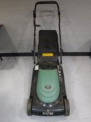 A Hayter Spirit 41 electric lawn mower with grass box and lead