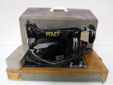 A cased mid 20th century Pfaff sewing machine (electrified)