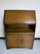 A mid twentieth century oak bureau