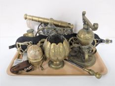 A tray of assorted brass ware - horse brasses, canon, figures,