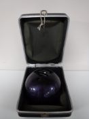 A cased Columbia 300 bowling ball with keys