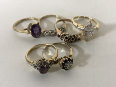 A 9ct gold amethyst and diamond ring, another 9ct gold amethyst set ring,
