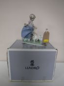 A boxed Lladro figure,