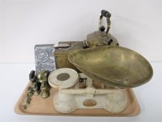 A tray of brass ware including spirit kettle on stand, embossed tea caddy,