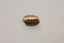 An antique 15ct gold ring, size N/O.