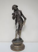 A spelter figure on brass base Incroyable Par L.