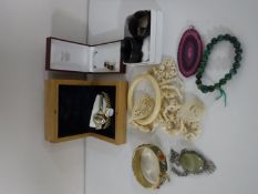 An antique ivory bangle together with two lady's wrist watches, antique horn napkin rings etc.