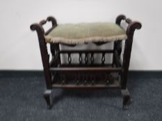 An Edwardian mahogany adjustable piano stool