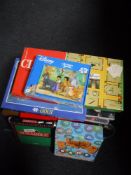 A vintage sledge, together with assorted board games, two boomerangs, table tennis bats,