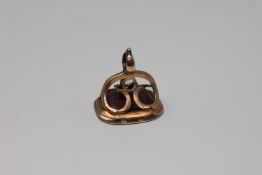 A Georgian gold mounted intaglio seal bearing initials R A