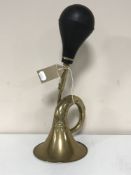 A vintage brass bulb horn