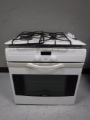 A Whirlpool integrated electric oven with gas hob