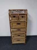 A bamboo and wicker six drawer chest