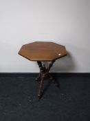 A mahogany octagonal gypsy table on three way support