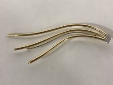 An 18ct gold diamond set hair ornament,