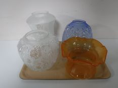A tray containing four Victorian glass oil lamp shades