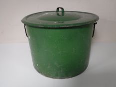 A cast iron cooking pot with lid (green)