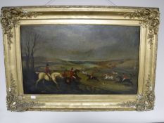 A 19th century gilt framed oil on canvas depicting a hunting scene,
