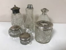 A small collection of crystal and glass dressing table bottles etc,