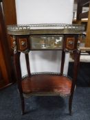 A French ormolu mounted marble topped two tier stand