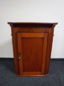 A Victorian mahogany corner cabinet