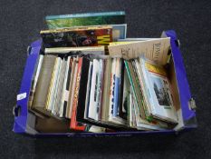 A box of leaflets, travel guides,