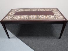 A rosewood tiled coffee table