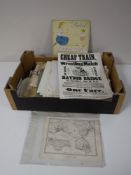 A large box containing advertising posters, decorative pictures, continental scrapbook,