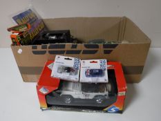 A box containing a quantity of die cast vehicles,