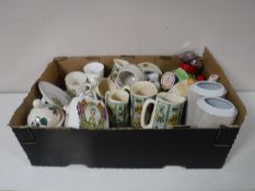 A box of commemorative china, Ringtons jugs, kitchenware,